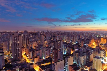 Fototapeta premium Aerial view of sunset in the city life scene. Urban scenery. Great landscape.
