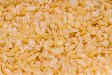 Peeled split mung bean .pile of skinless mung bean. pile of Yellow moong mung dal lentil pulse bean in  street food market. Dried Organic Moong Dal Split  Vigna radiata