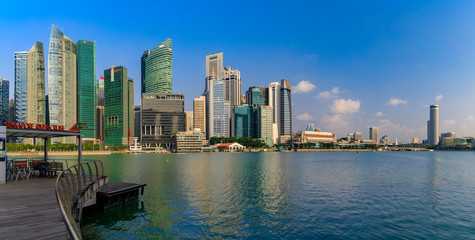 Singapore skyline of downtown business district at Marina Bay with the Esplanade and river cruise pier in the foreground © SvetlanaSF