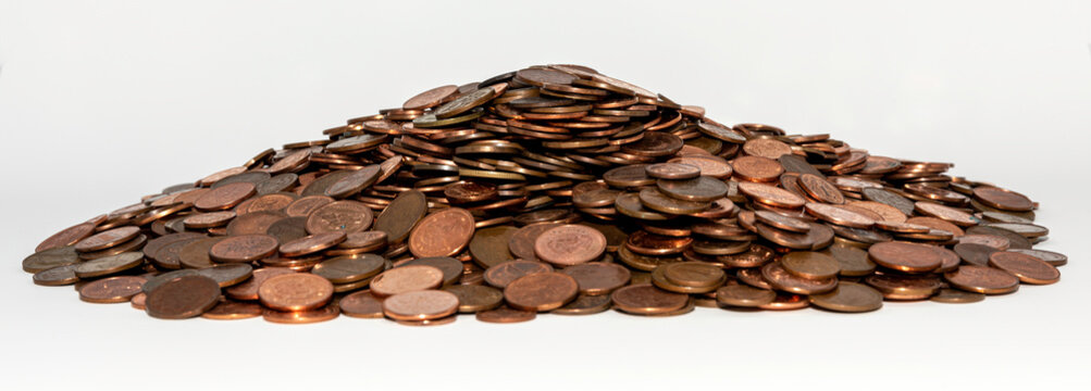A Strait On Shot Of A Big Pile Of Copper Coins On A White Background
