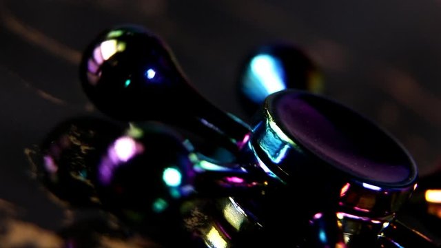 A spinning fast colorful fidget spinner macro close up
