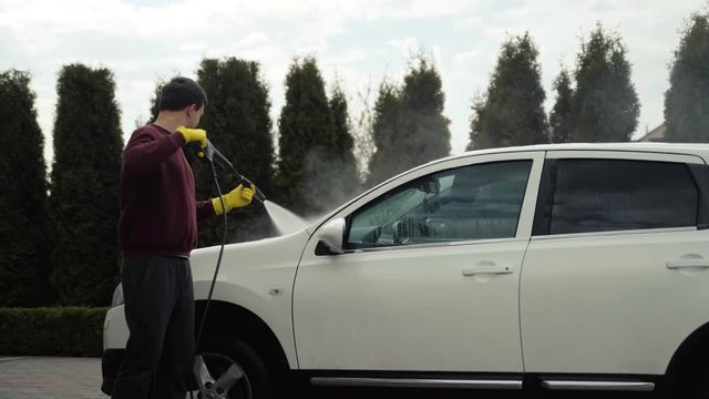 Washing of high-priced car, car washing process karcher and soap.