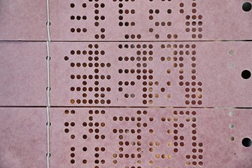 Punch card for controlling programmable industrial weaving loom, an early example of automation. Chains of punchcards used to store patterns