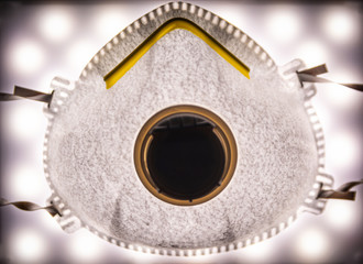 Abstract photograph of a ffp2 mask that are useful to combat Covid-19