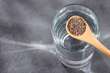 Spoon with chia seeds to mix with water - Salvia hispánica