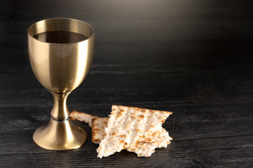 Communion or the Lords Supper on a Black Wood Table