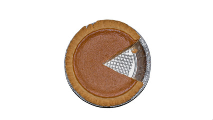 Pumpkin pie dessert isolated on white background.  Fresh from the oven home made baking. Slice of pie missing. Delicious traditional Thanksgiving dish wallpaper
