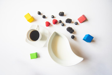 Obraz na płótnie Canvas Cup of coffee with raspberry on white background.