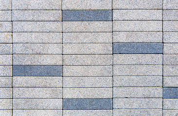 New paving slabs of rectangular shape. Covering for the sidewalk. Texture or background