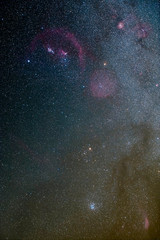 Orion Constellation with the hunter and Orion Nebulae is and amazing place on the universe. In the lower right we can see Betelgeuse a giant red star that is going to explode and create a supernova
