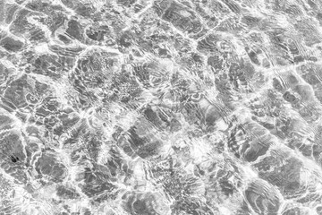 Waves Pattern in crystal clear water on black and white