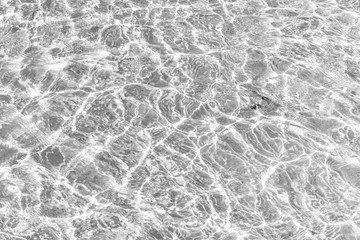 Waves Pattern in crystal clear water on black and white