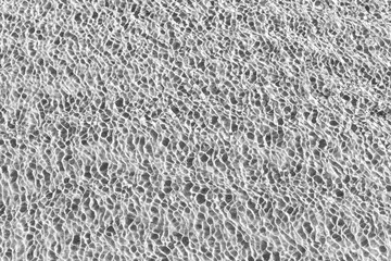 Waves Pattern in crystal clear water on black and white