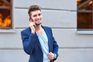 business man talking on the phone. Successful conversation with a partner or client, good bargain