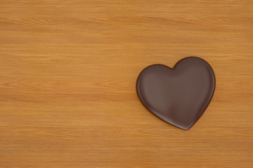 Heart on wood board. 3D illustration.