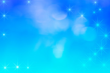 Abstract background of white bokeh on a blue background