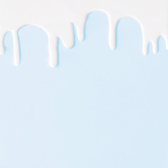 Liquid flowing down concept on pastel background