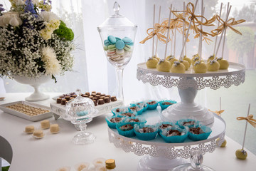decoration elements for banquets and parties, chocolate, candles, flowers, glasses
