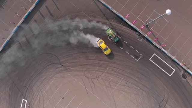 Two cars drifting
Pair drift