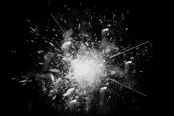 Freeze motion of white powder exploding shatter splatter