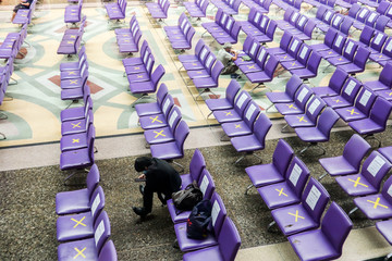 Bangkok, Thailand - Asian people waiting the train keep distance protect from COVID-19