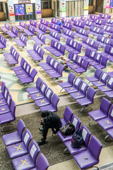Bangkok, Thailand - Asian people waiting the train keep distance protect from COVID-19