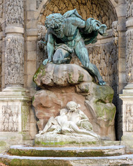Fototapeta na wymiar Polyphemus Surprising Acis and Galatea as part of the Medici Fountain in the Luxembourg Gardens, Paris, France