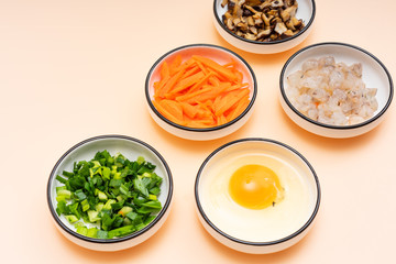 Chinese cutlery contains different chopped raw ingredients