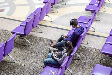 Bangkok, Thailand - Asian people waiting the train keep distance protect from COVID-19