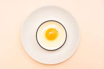 Raw eggs in a Chinese tableware dish