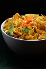 crispy potatoes sticks served on bowl, also known as kering kentang