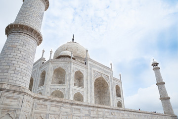 upward view of white tomb of Taj Mahal