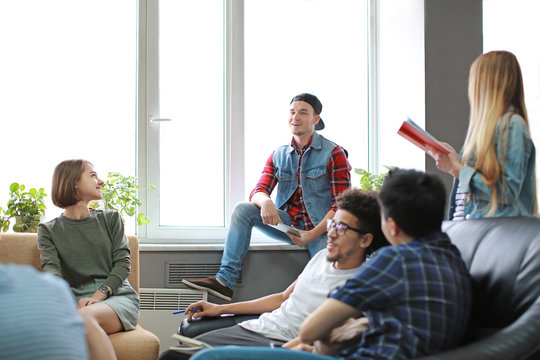 Students resting together in campus building
