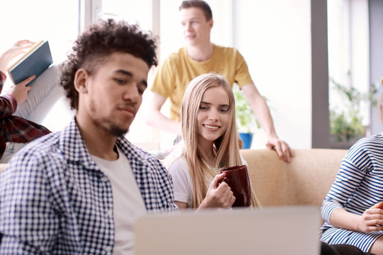 Students resting together in campus building