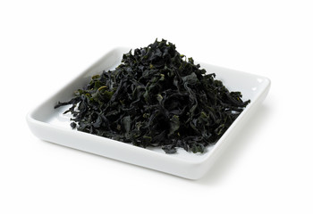 Dried seaweed placed on white background