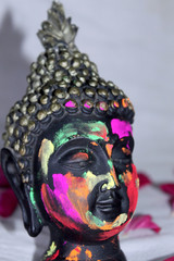 colorful face of lord Buddha statue