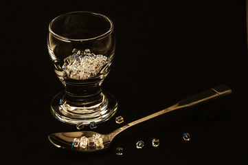 
crystal stack with crystals and a silver spoon