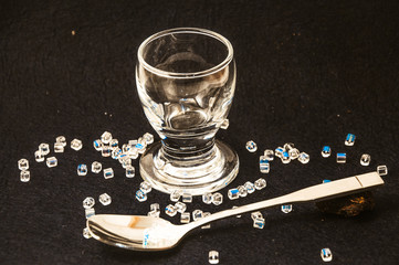 
crystal stack with crystals and a silver spoon