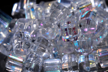 square transparent beads on a black background