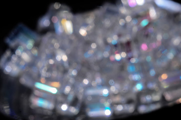square transparent beads on a black background