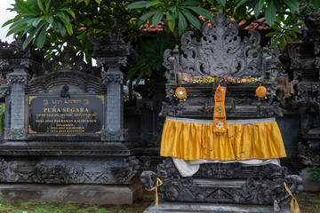 Balinese temple with decorations and statues