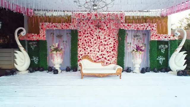 Indian hindu wedding decorated lavish stage.