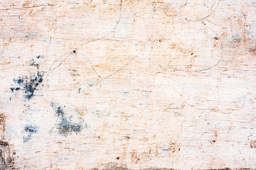 Texture of a concrete wall with cracks and scratches which can be used as a background