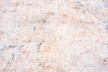 Texture of a concrete wall with cracks and scratches which can be used as a background