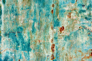 Metal texture with scratches and cracks which can be used as a background