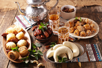 assorted of arabian pastry and mint tea