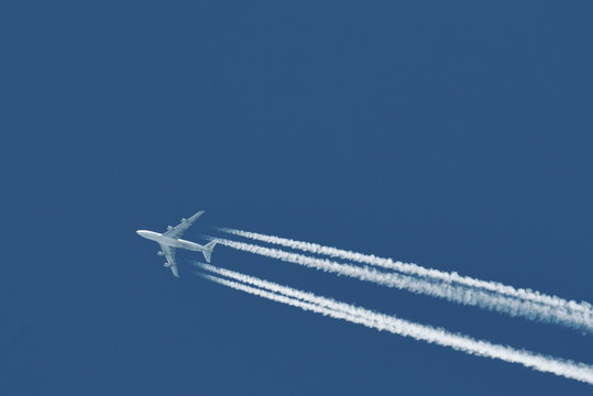 Airplane With Plane Trails