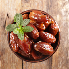 dried date in bowl and mint