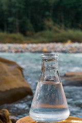 Glass flask with clean drinking water.