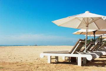 lounge chairs on the beach